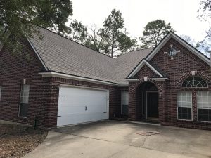 New Roof Replacement in The Woodlands Tx. with Timberline HDZ Lifetime Shingle in Weathered Wood with Timber Tex Hip & Ridge Row.
